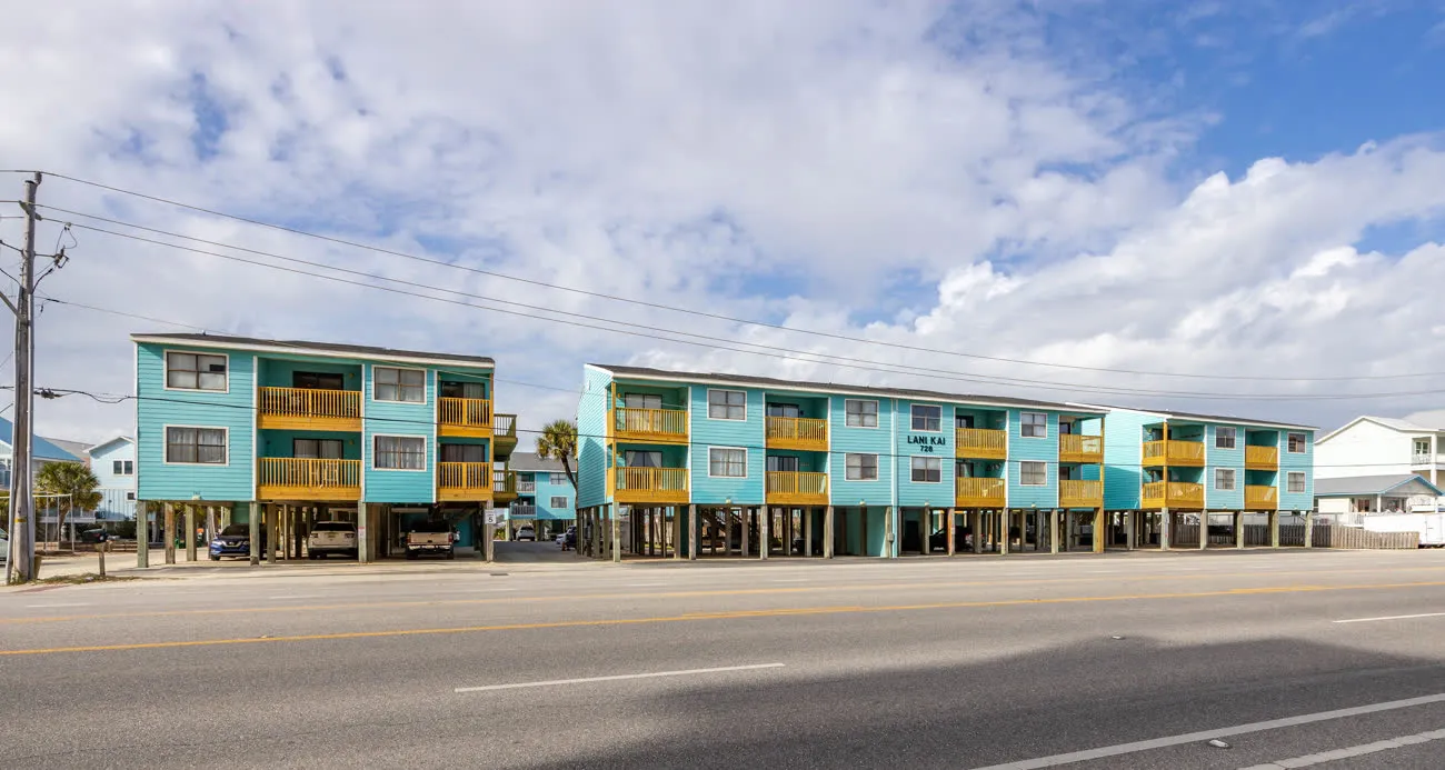 Wide street view of the Lani Kai complex