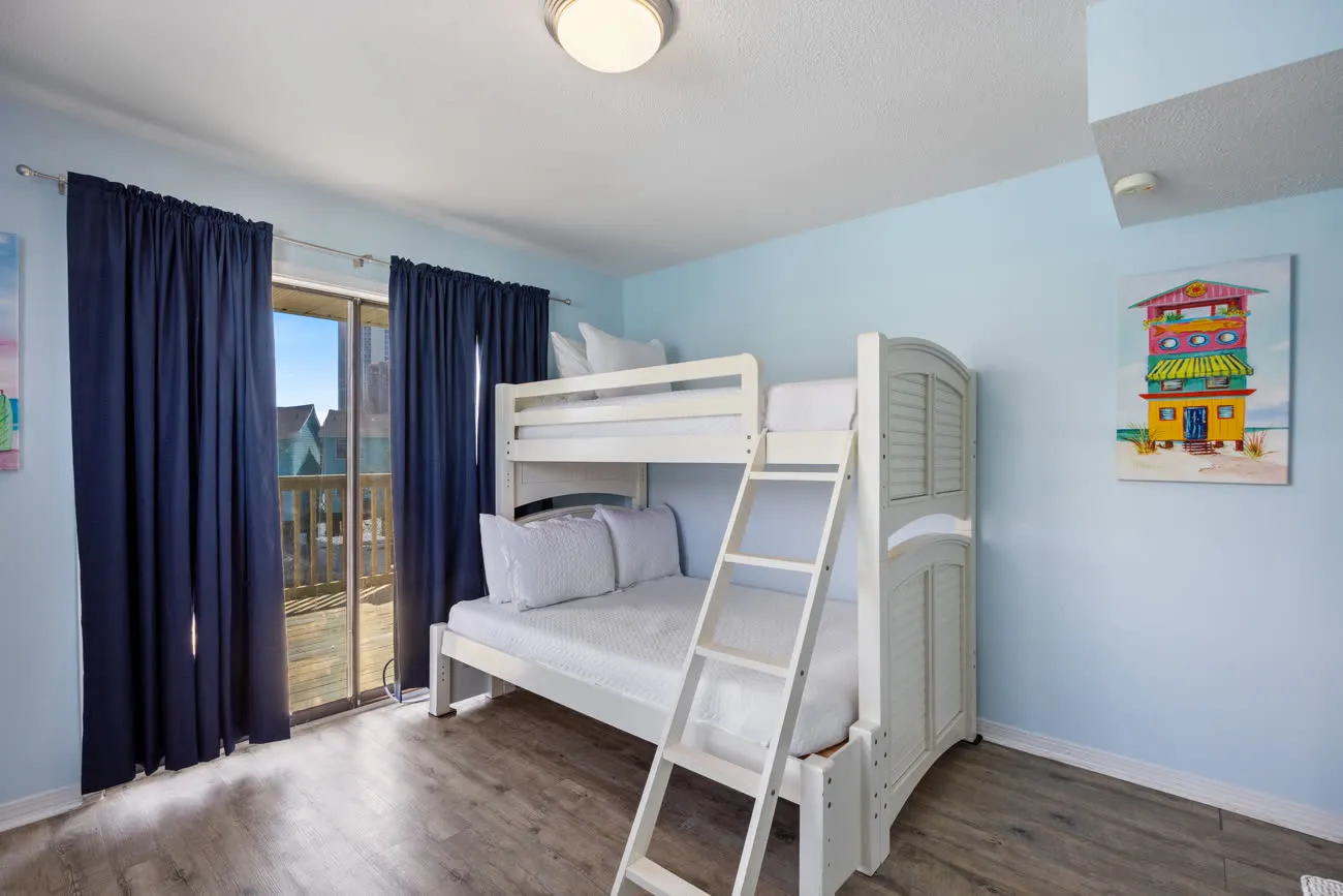 Second bedroom bunk bed with sliding balcony door