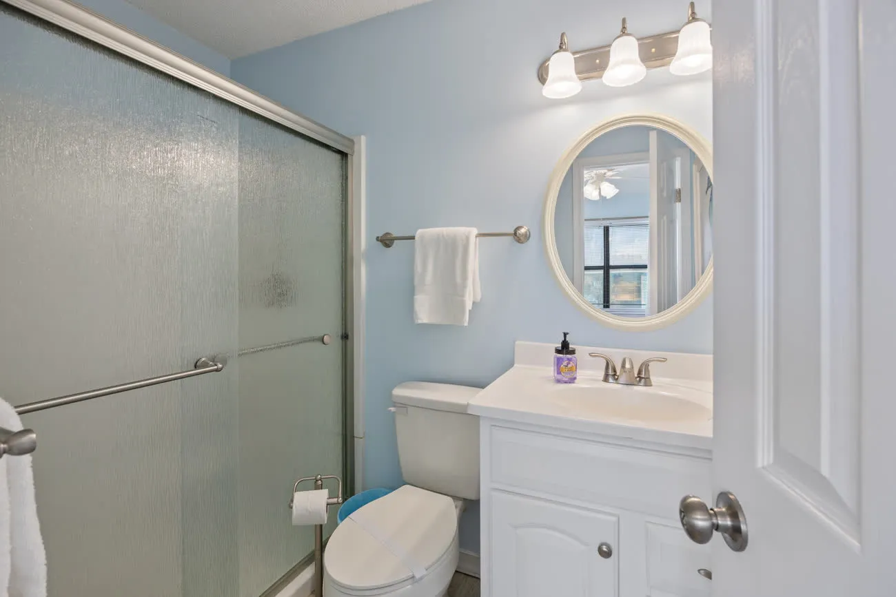 Master en-suite bathroom with stand-up shower and vanity