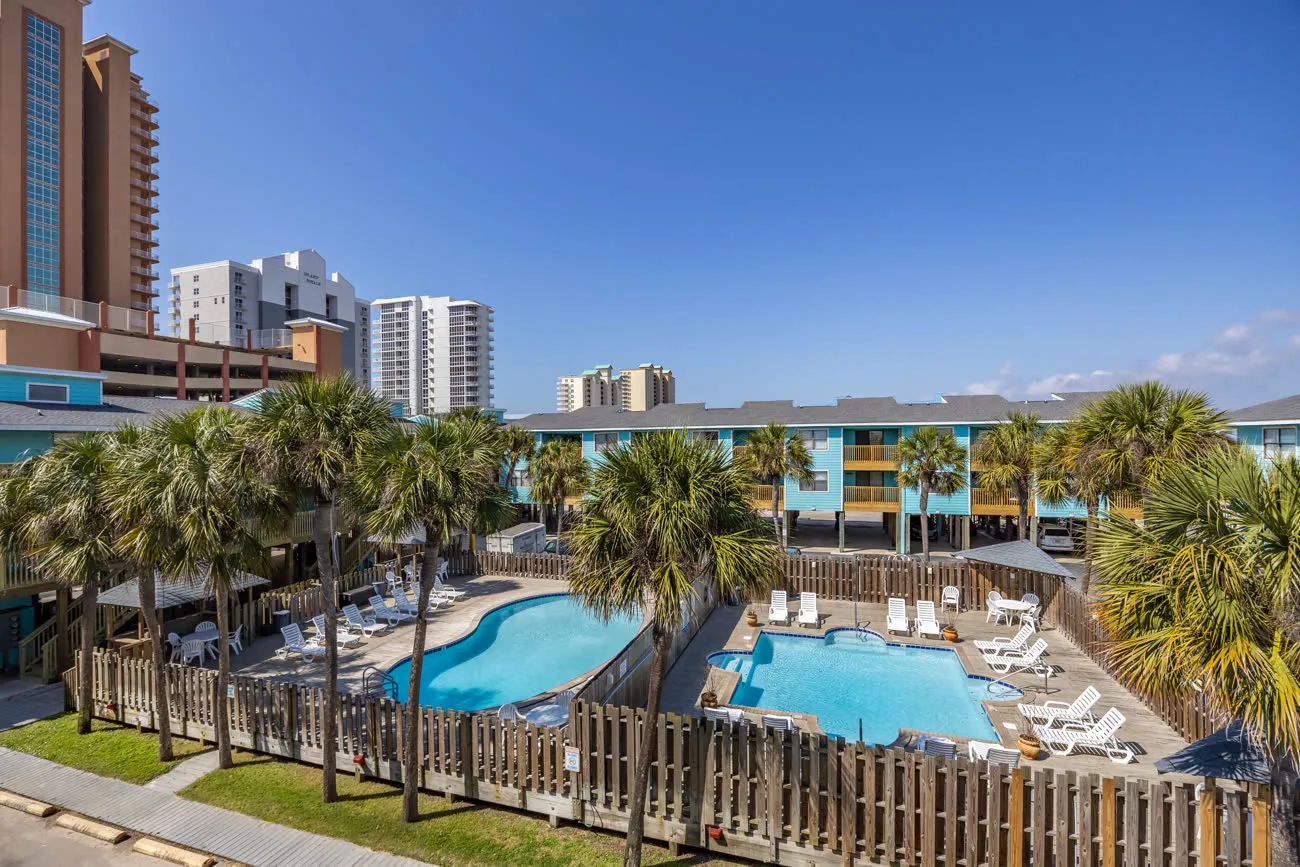 Both pools seen from above with high-rise in background