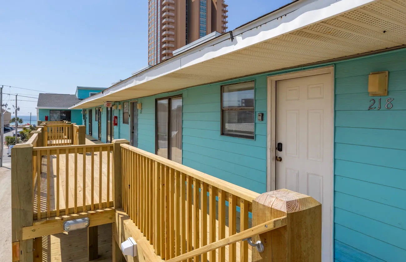 Exterior corridor leading to unit 218